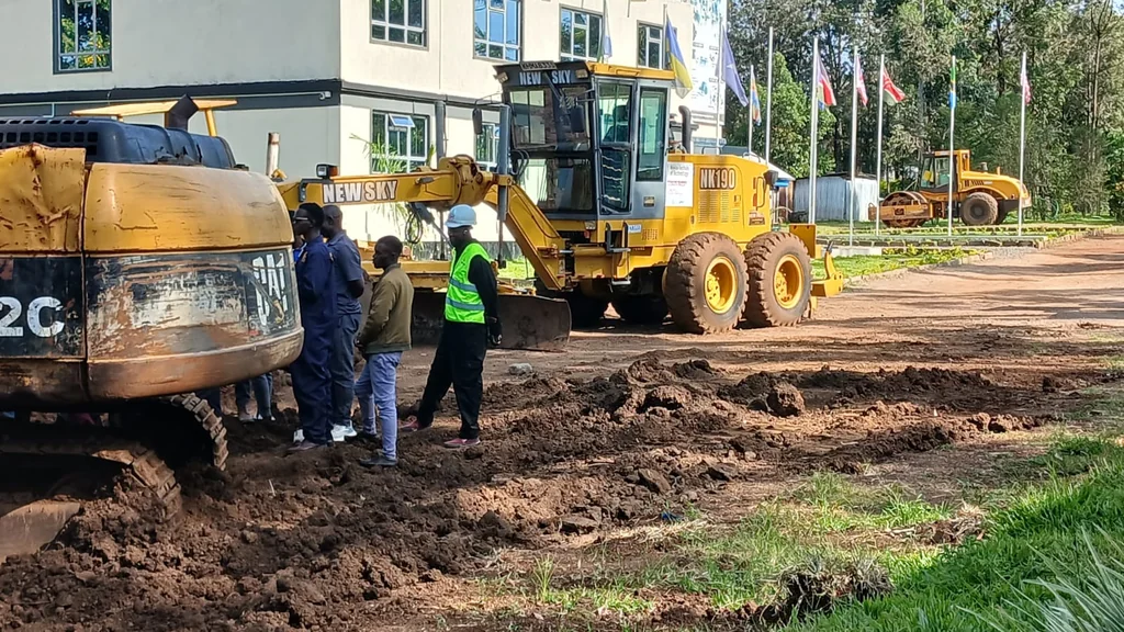 NIT students training on a heavy excavator at practical field grounds
